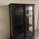Thai trapezoidal display cabinet in carved solid wood