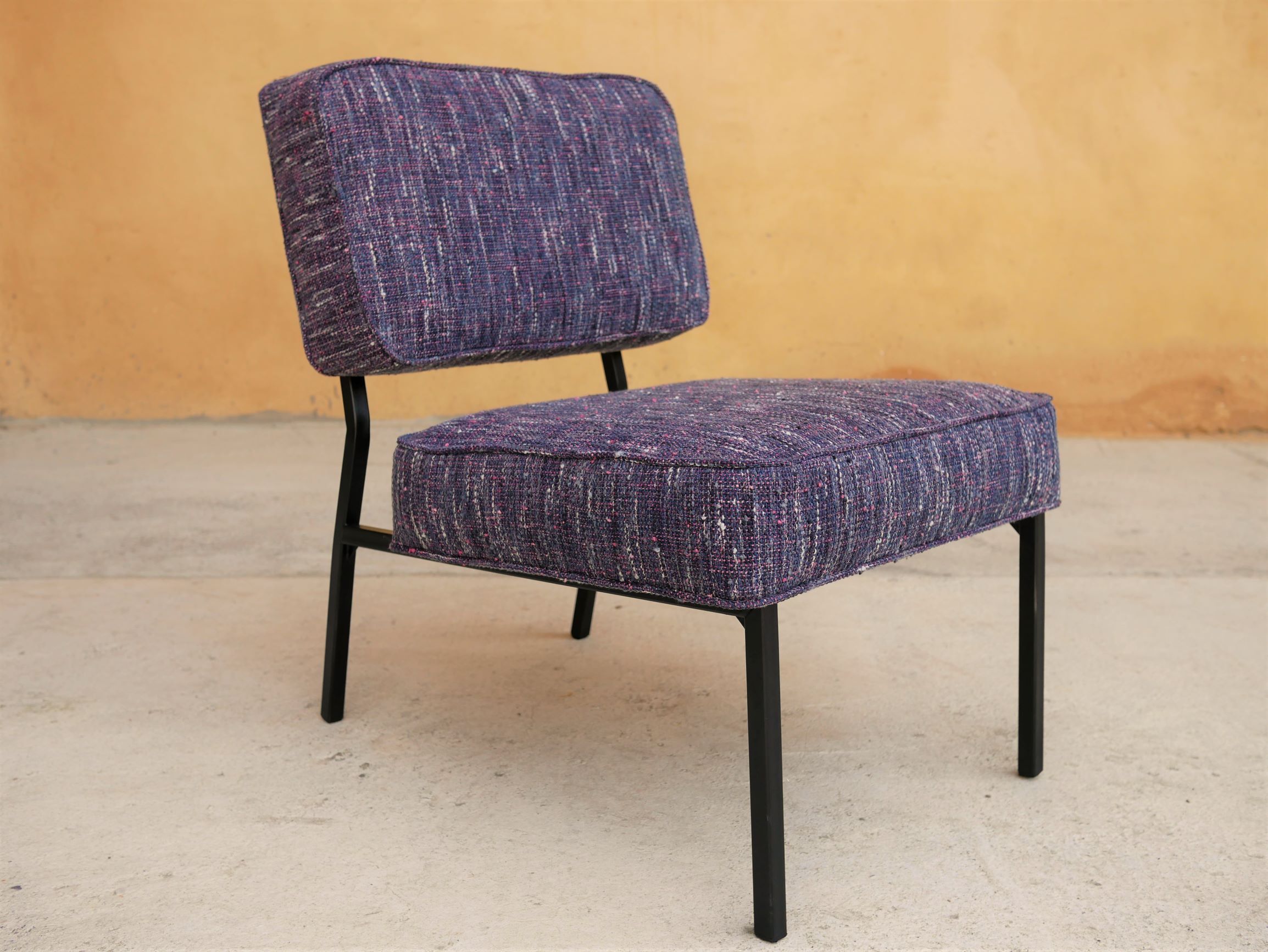 Vintage modernist metal foot armchair