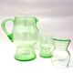 Art Deco carafe and its two glasses, in uraline