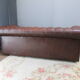 Brown leather chesterfield sofa