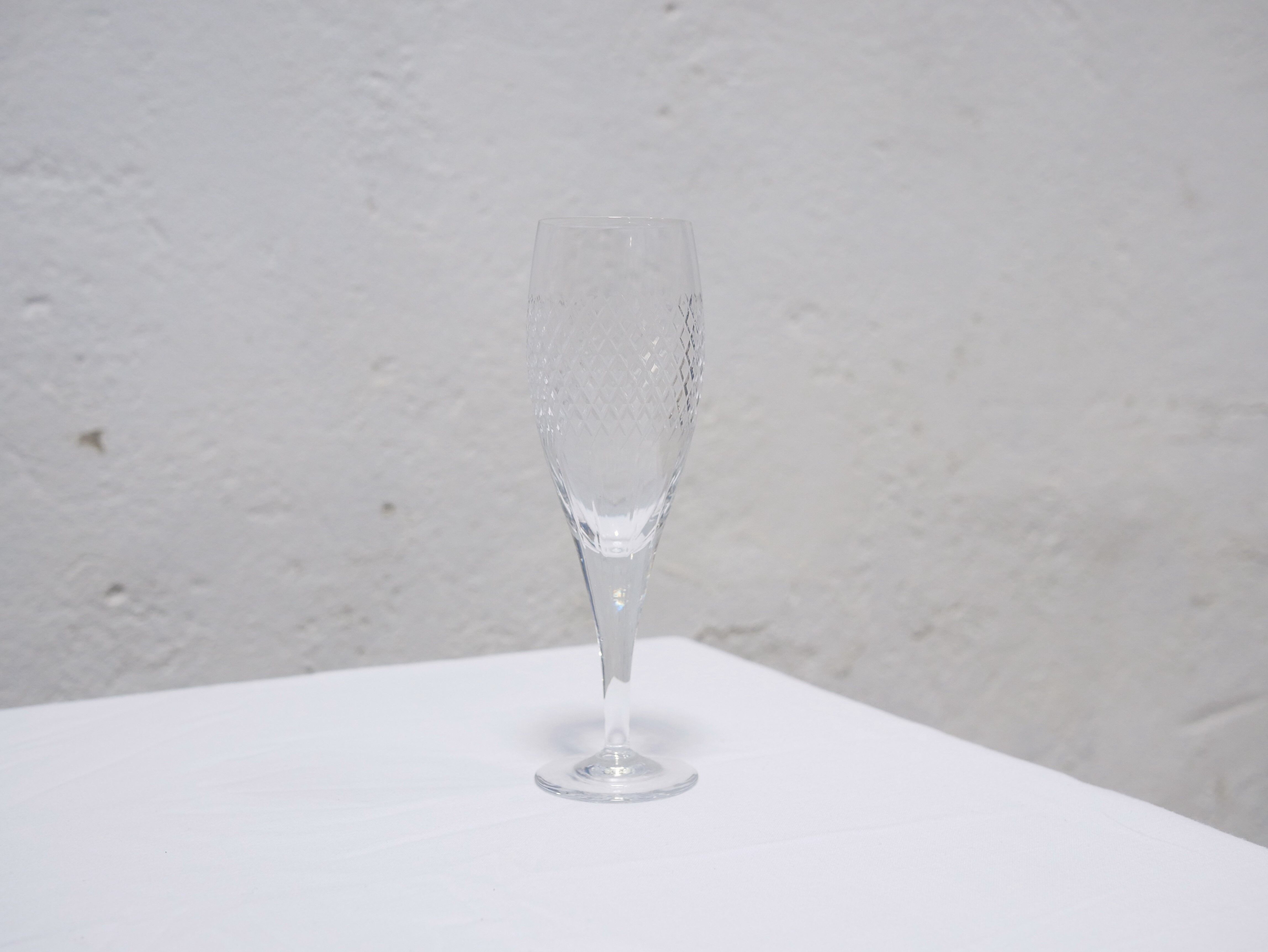 Series of 10 vintage crystal champagne flutes