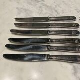 12 couteaux . métal argenté . art deco