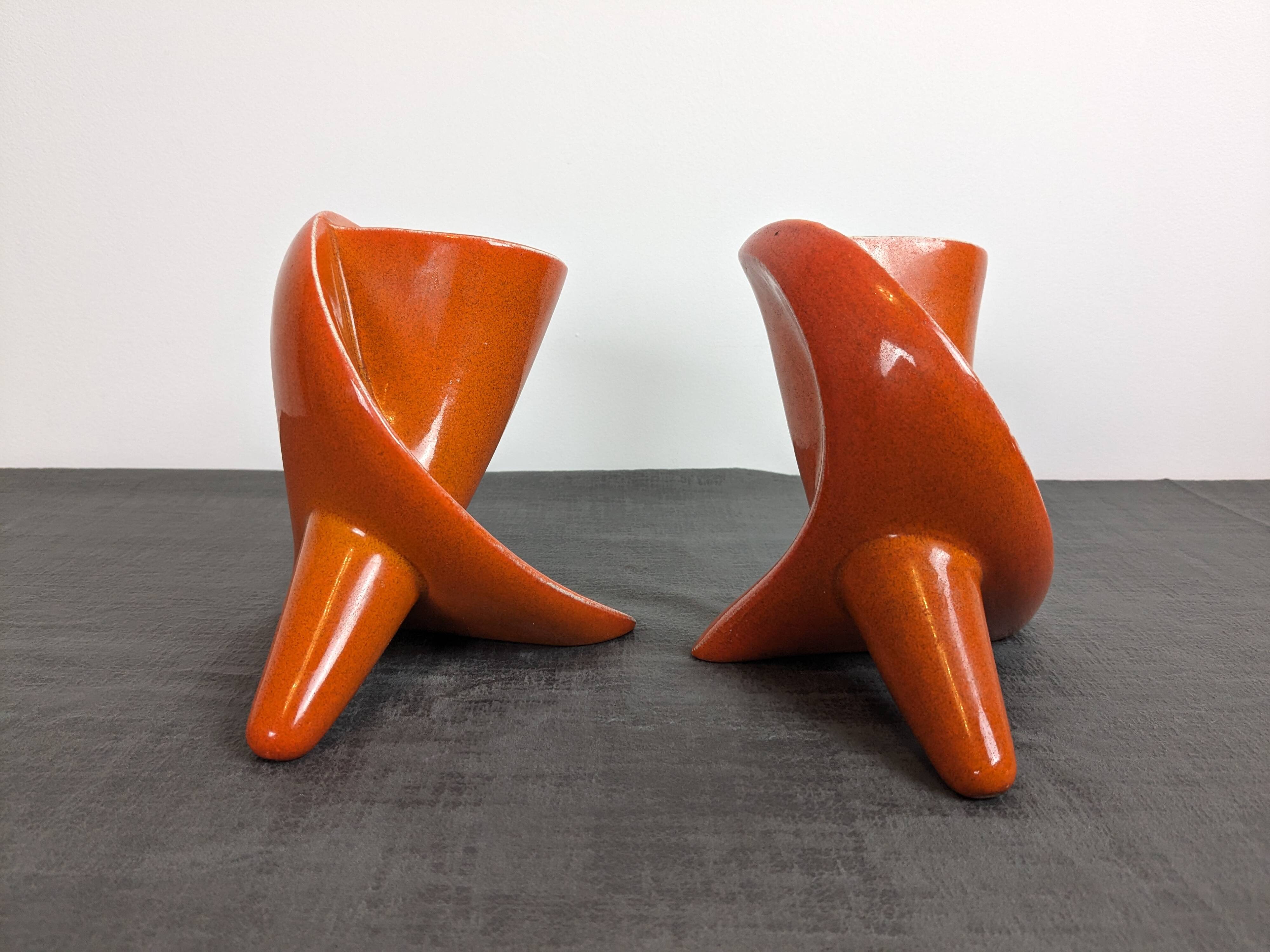 Pair of orange ceramic flower girls by Francis Lovas