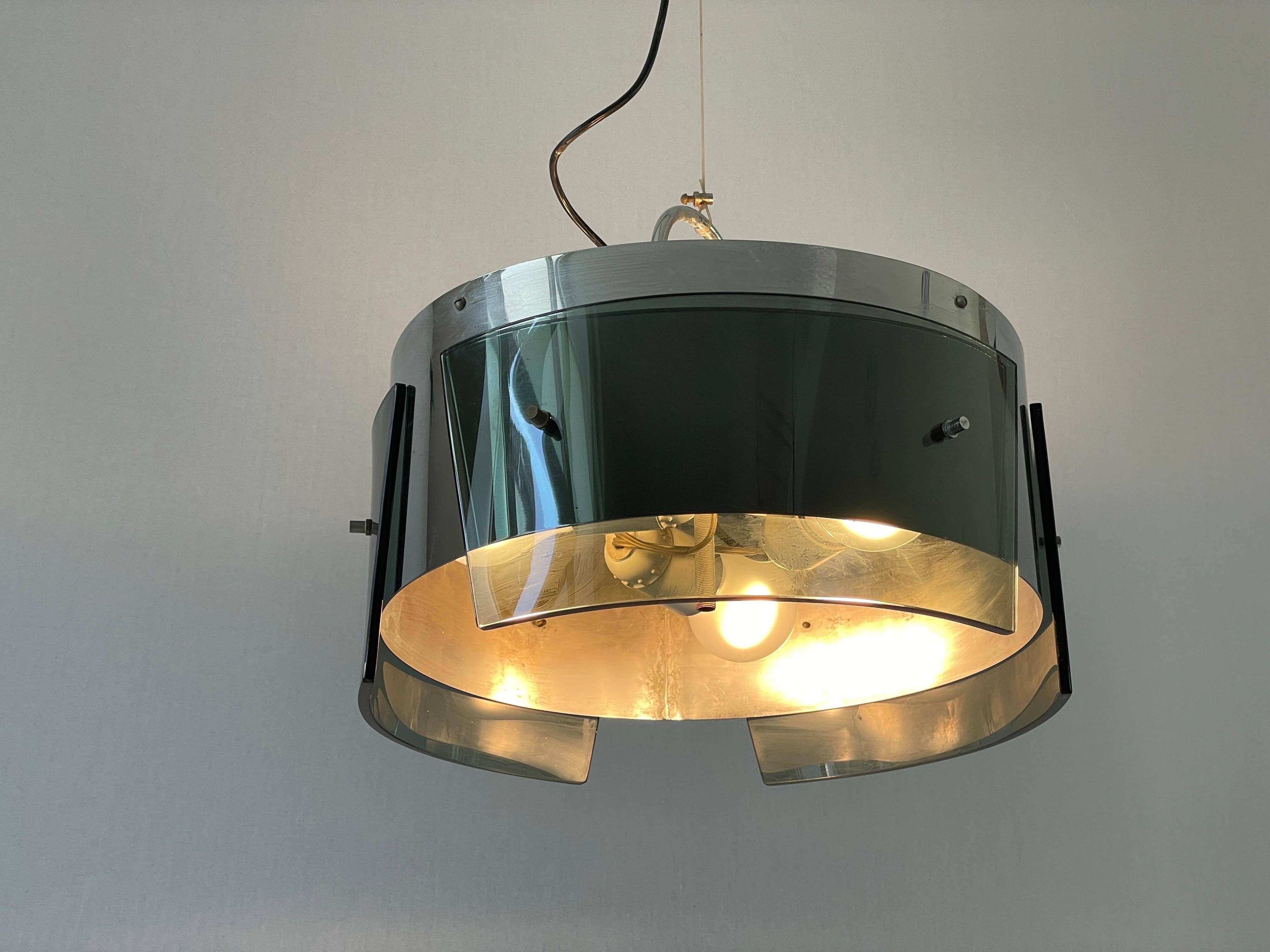 Suspended lamp in green glass and chrome, 1960s, Italy