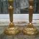 Pair of golden bronze candlesticks