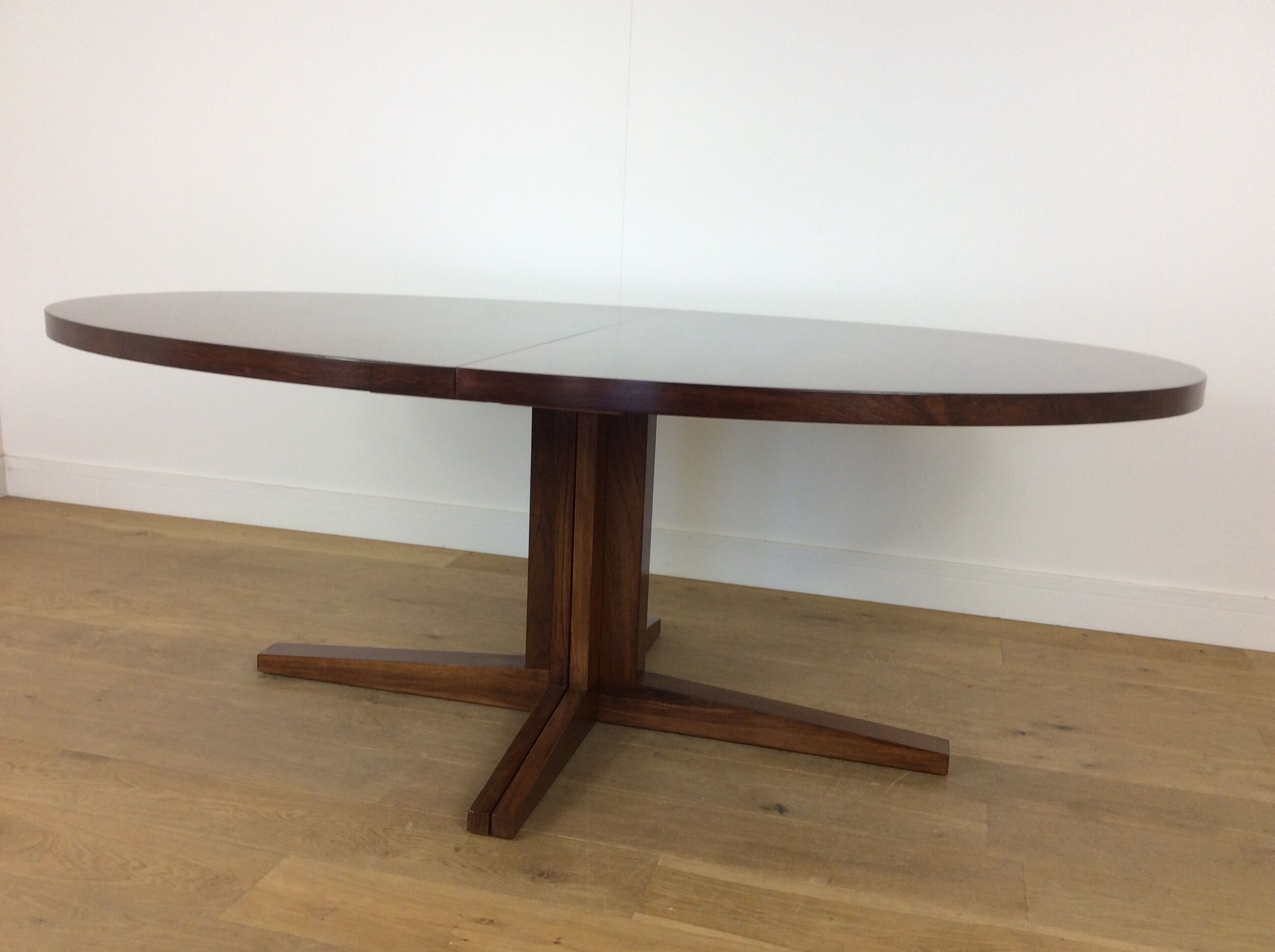 Mid century rosewood extendable dining table by John Mortensen