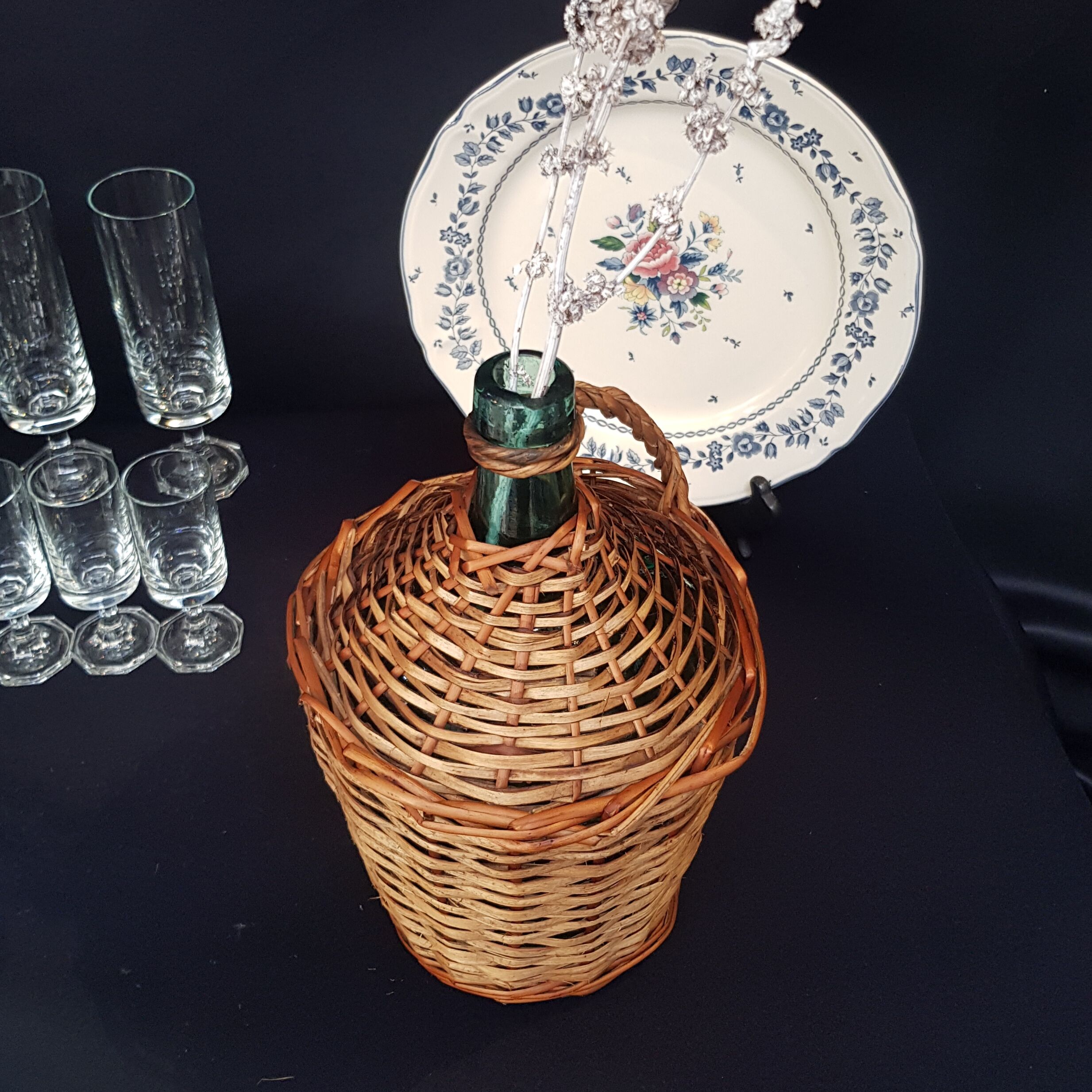 glass and rattan bottle