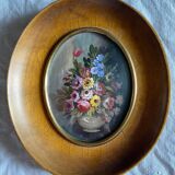Old painting "bouquet of flowers" with oval frame and glass