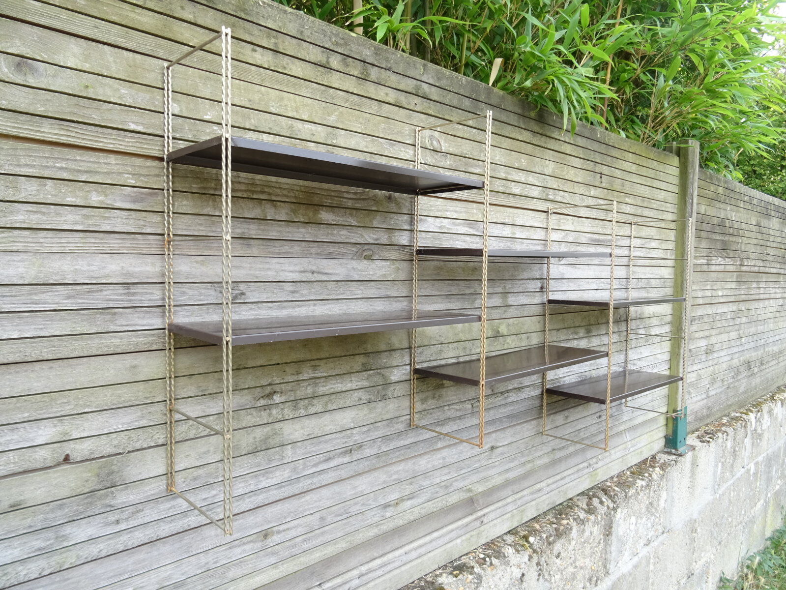 Modular metal string wall shelf