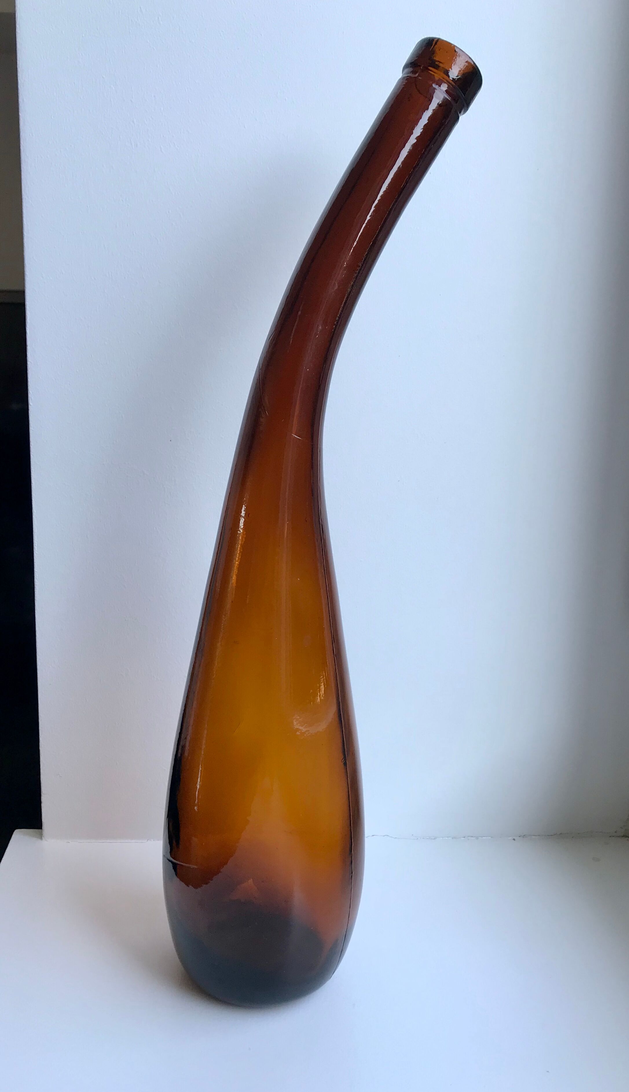 Amber bottle in blown glass 70s