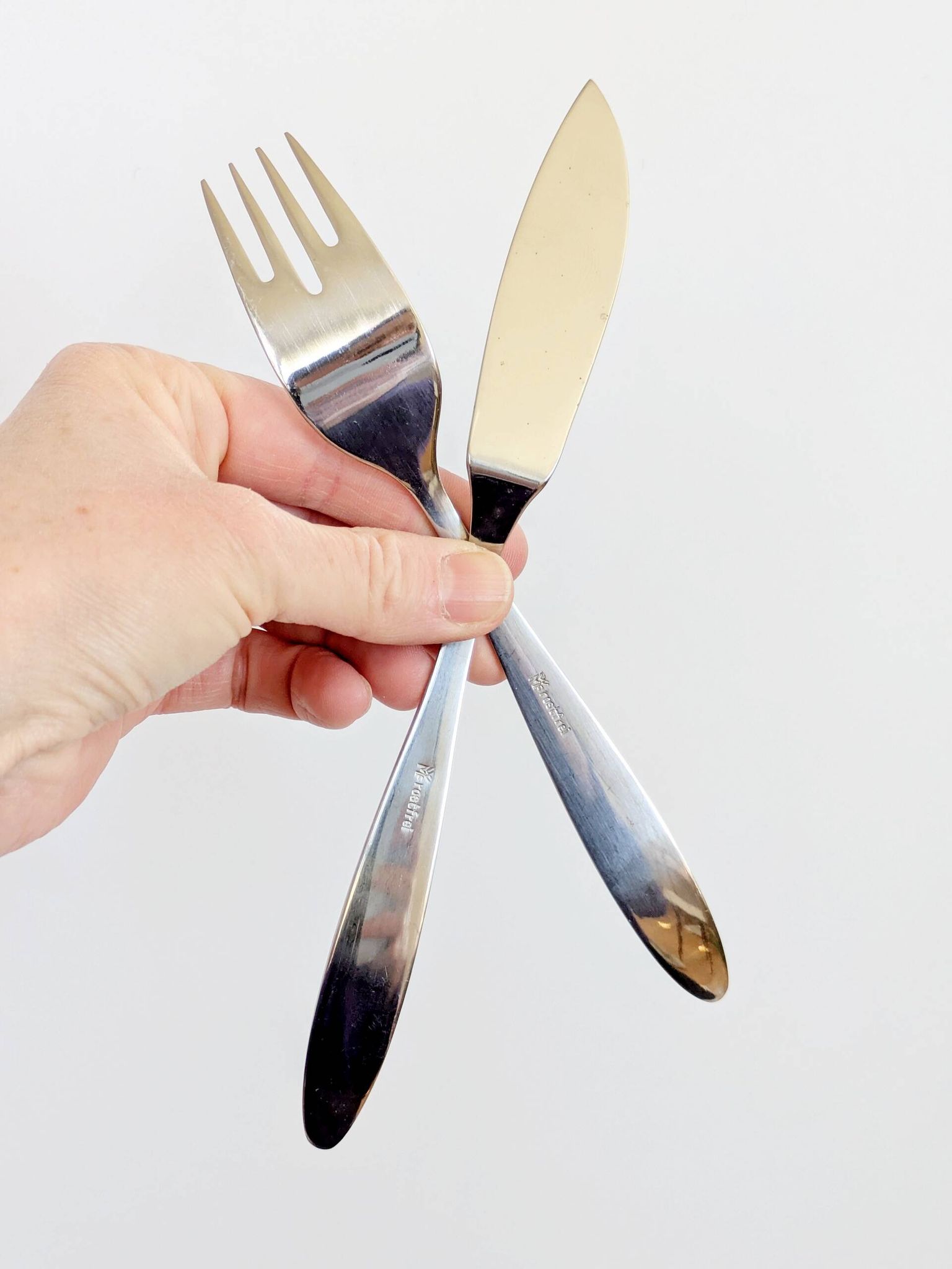 Service à poisson 12 pièces WMF inox avec coffret, années 60