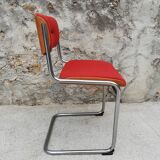 Red chair cantilever chrome tubes