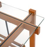 Wood and glass coffee table with wheels, 1960s.