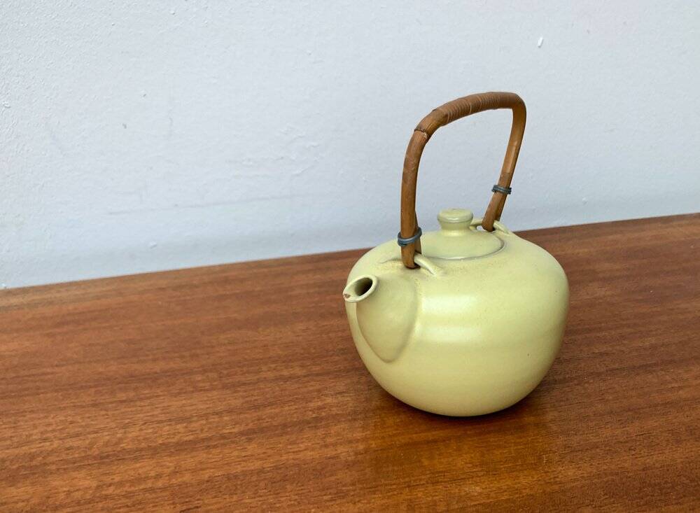 Mid-century ceramic teapot with bamboo handle, 1960s.