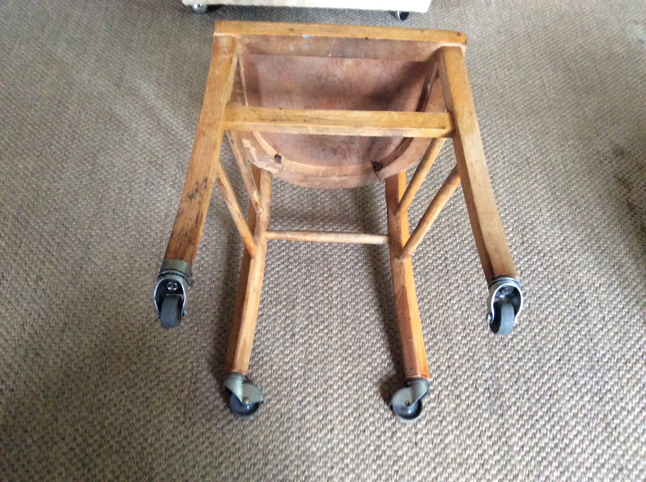 Wooden chair with wheels