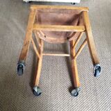 Wooden chair with wheels