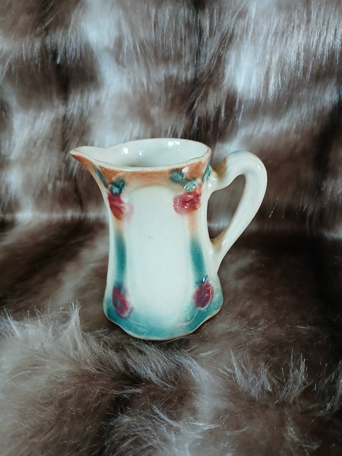 Antique slipware milk jug