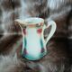 Antique slipware milk jug