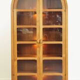 Elegant vintage Danish display cabinet with glass panels and atmospheric lighting