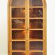Elegant vintage Danish display cabinet with glass panels and atmospheric lighting
