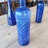 3 blue bottles