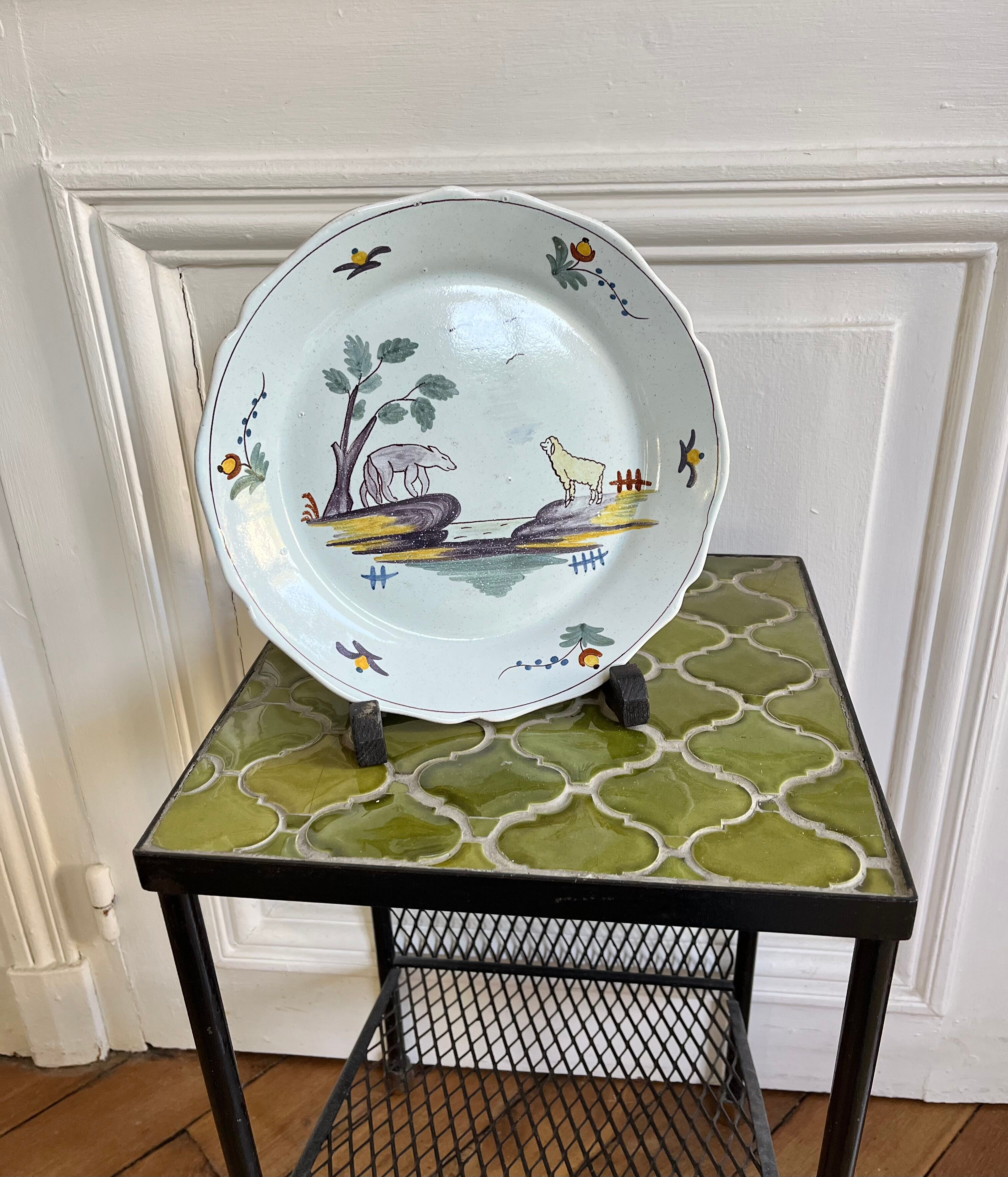 Decorative ceramic plate with "The Wolf and the Lamb" design