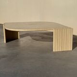 Large designer coffee table in travertine, eye shape, Roche Bobois edition from the 80s