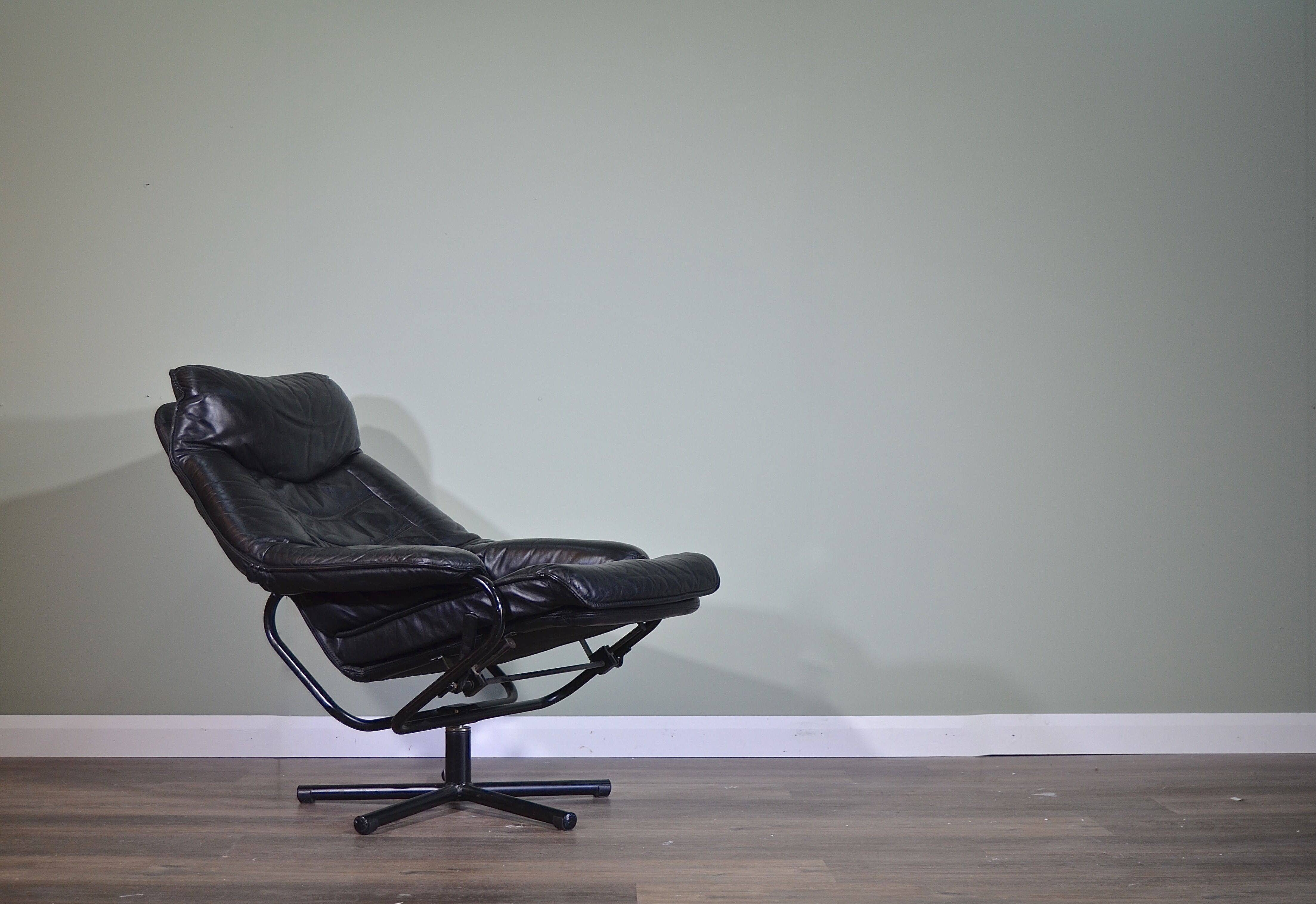 Norwegian Skoghaug industries vintage black leather swivel reclining chair