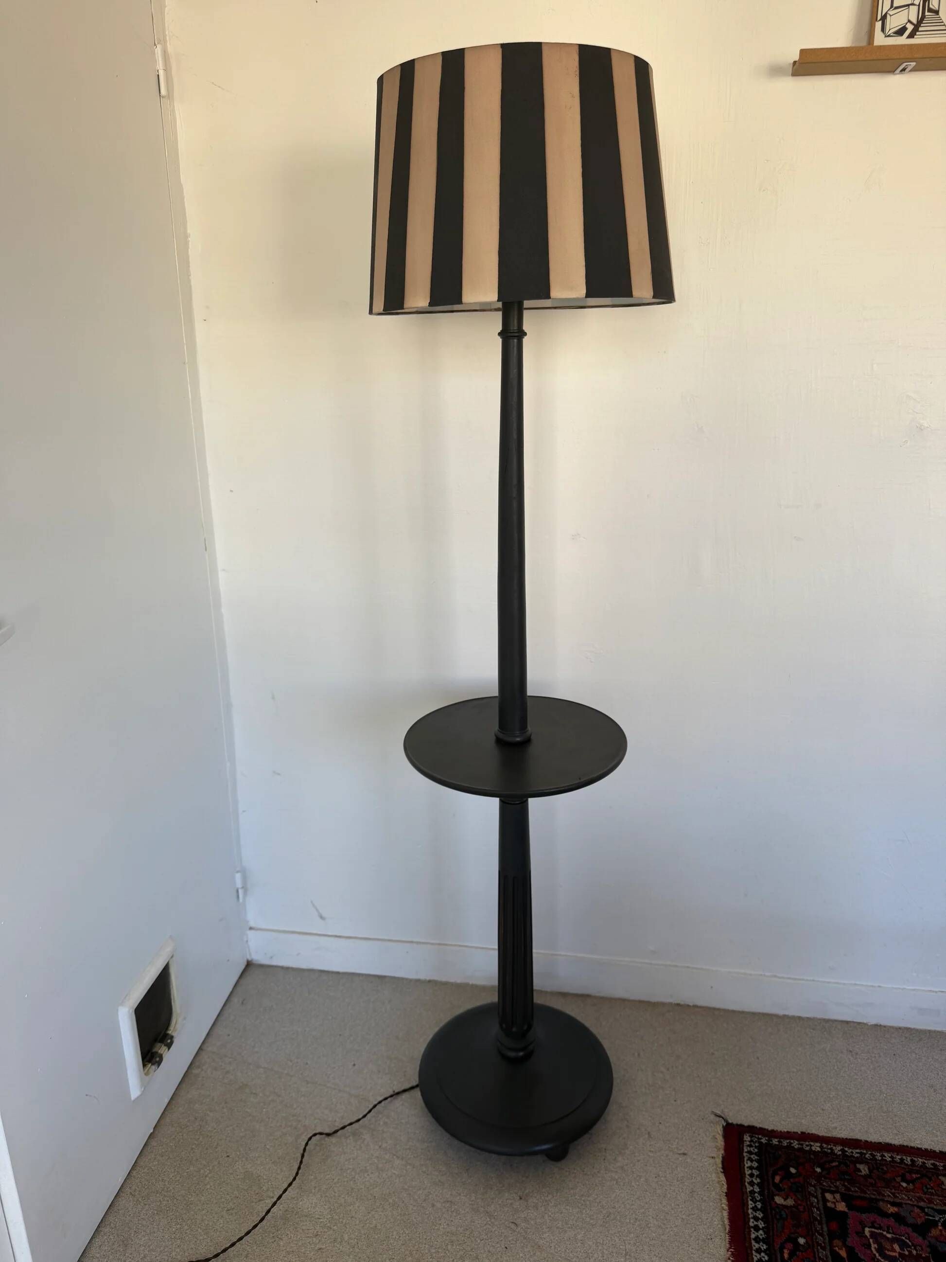 Vintage floor lamp in black patinated wood and striped lampshade