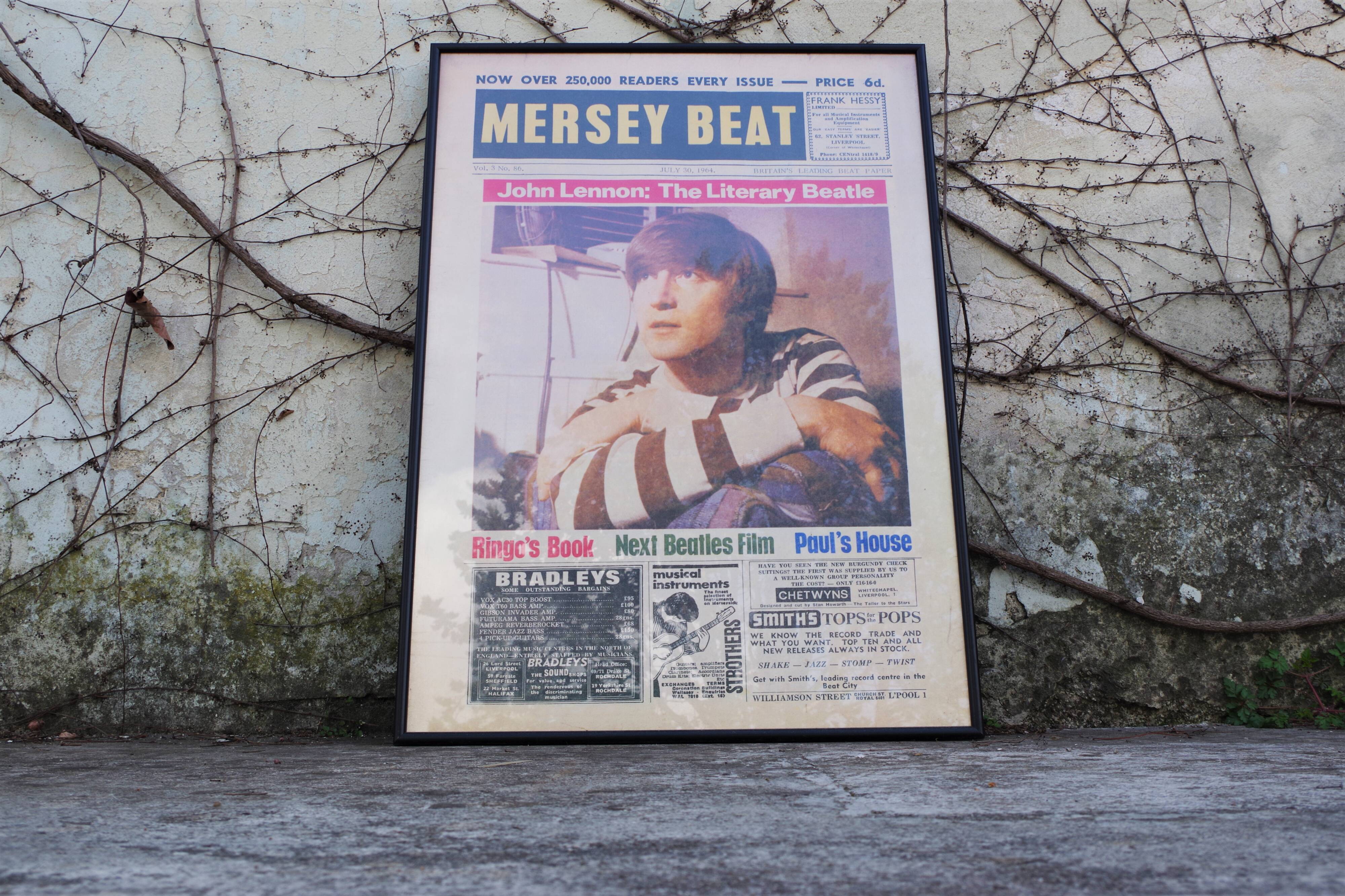 Vintage Beatles poster depicting John Lennon