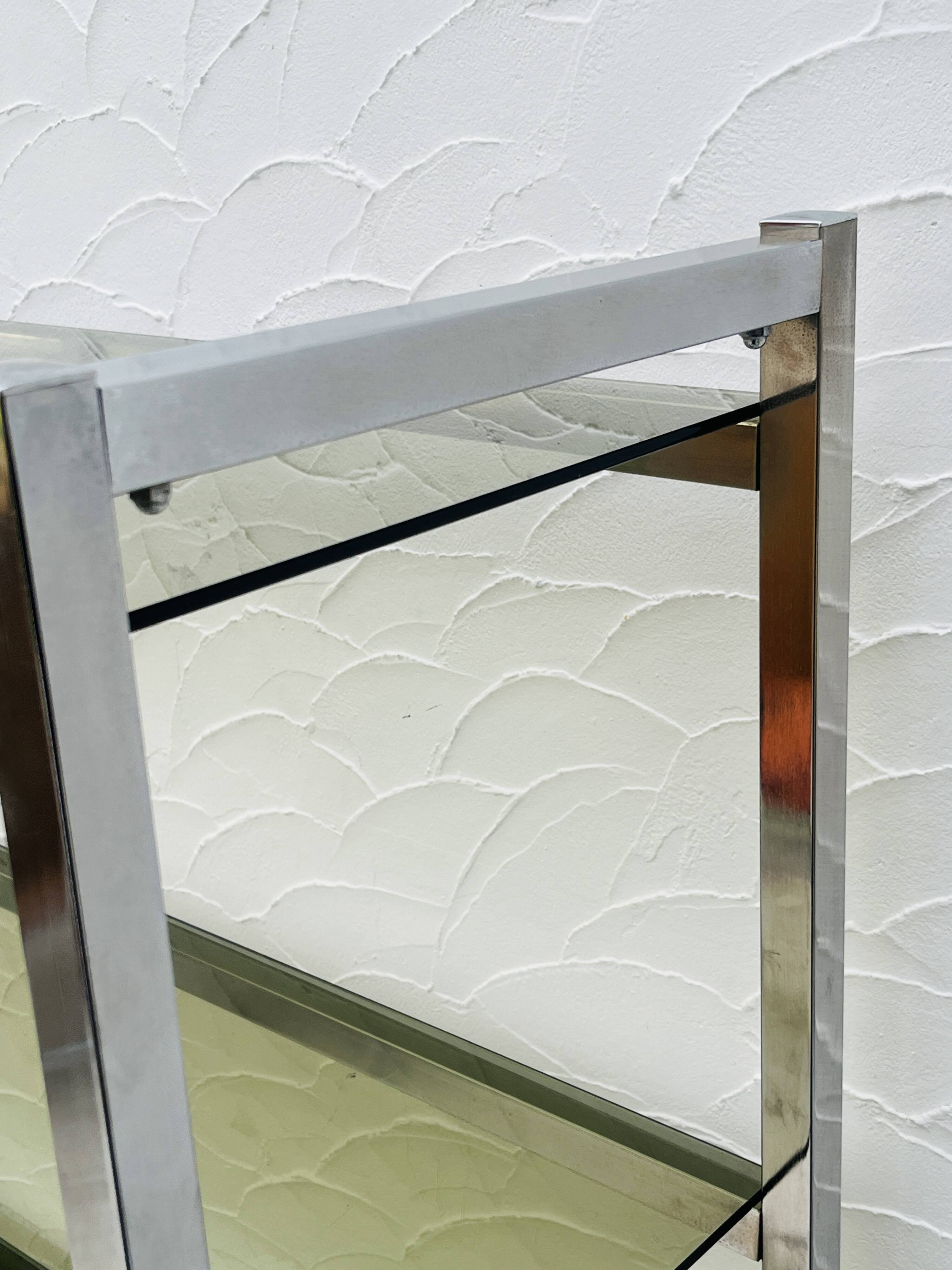 Vintage Italian design shelf in chrome and smoked glass from the 1970s.