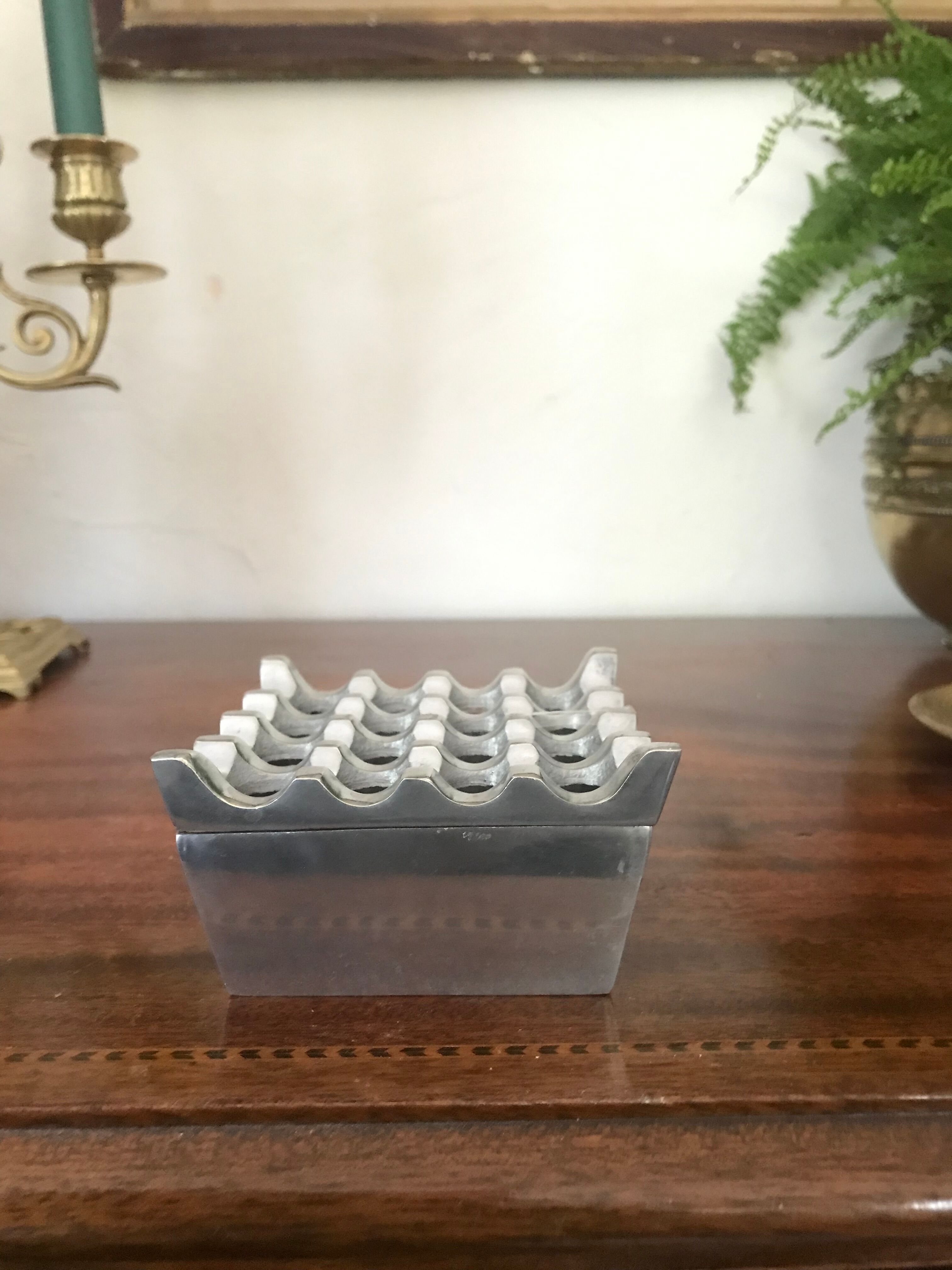 Design ashtray in cast aluminum