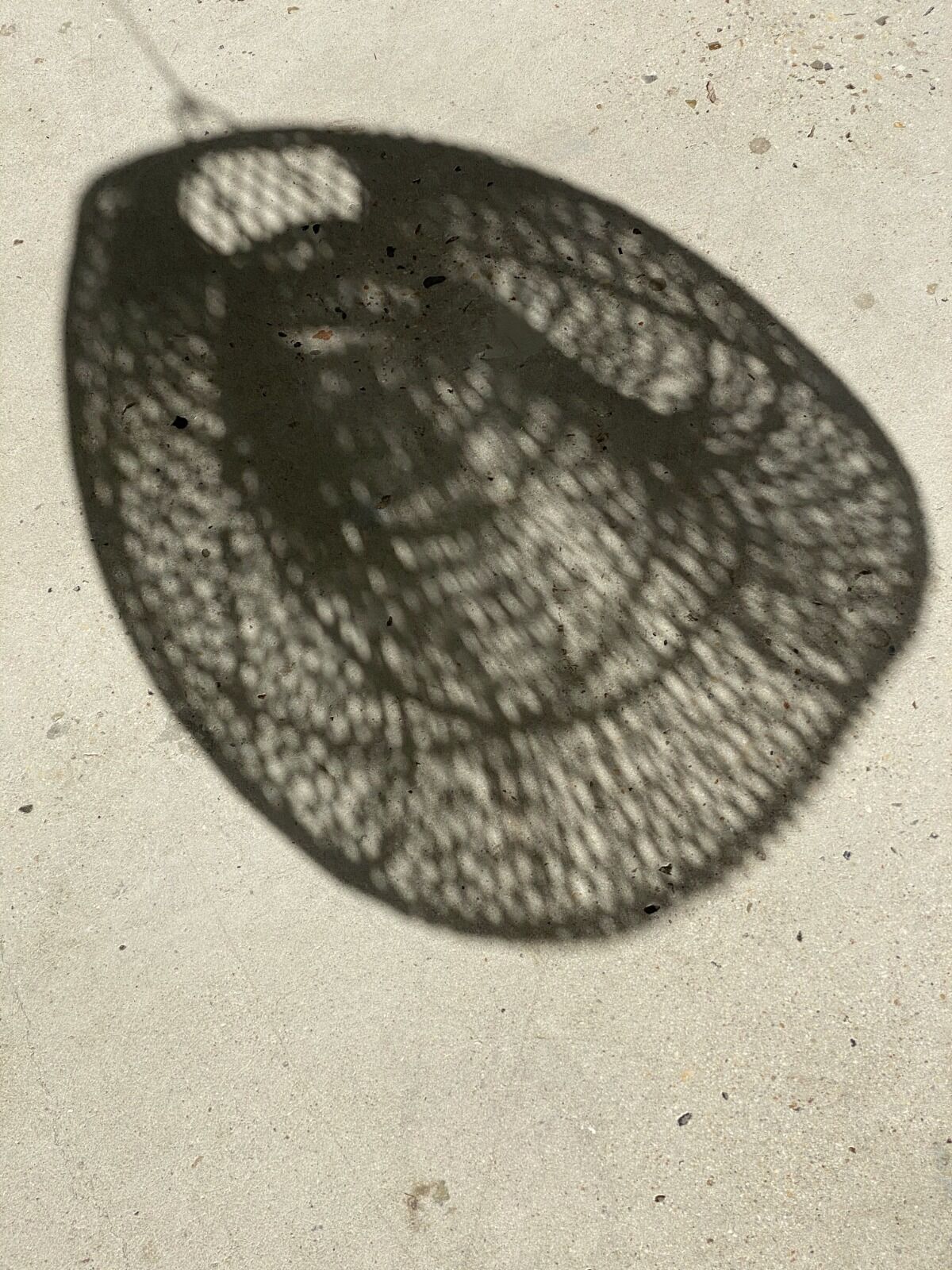 Small rattan lampshade in the shape of a braided hat