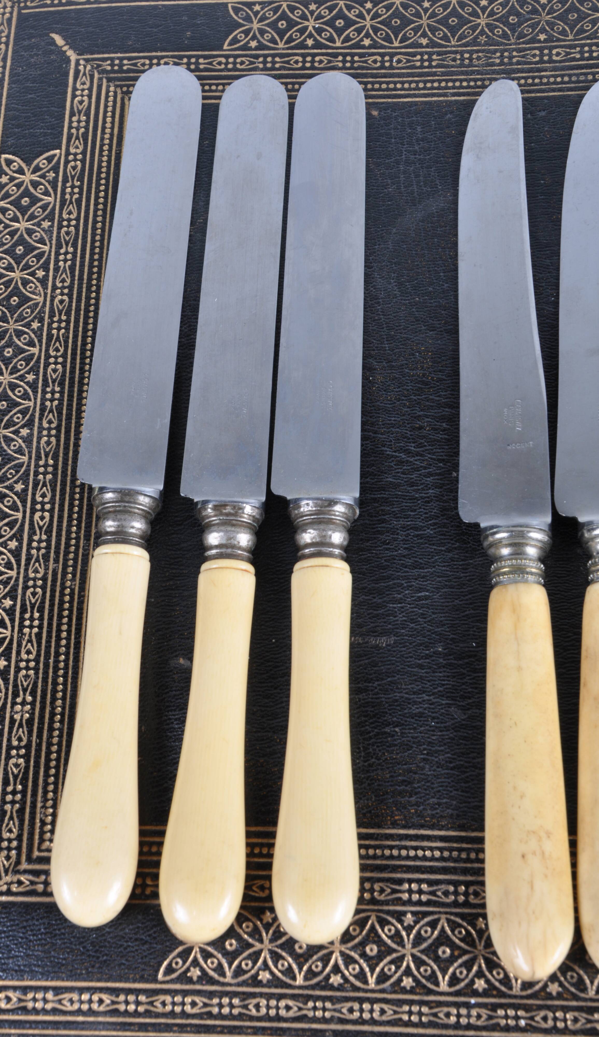 Antique knives with ivory handles.