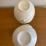 Paire de vases en biscuit decor putti et tête de bélier