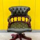 Chesterfield Revolving Captain's Chair with Green Leather Upholstery