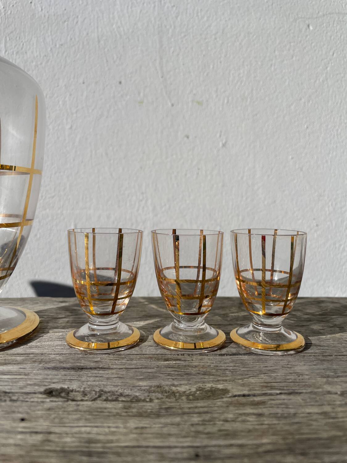 Art Deco glass and gold carafe or vase from the 1950s.