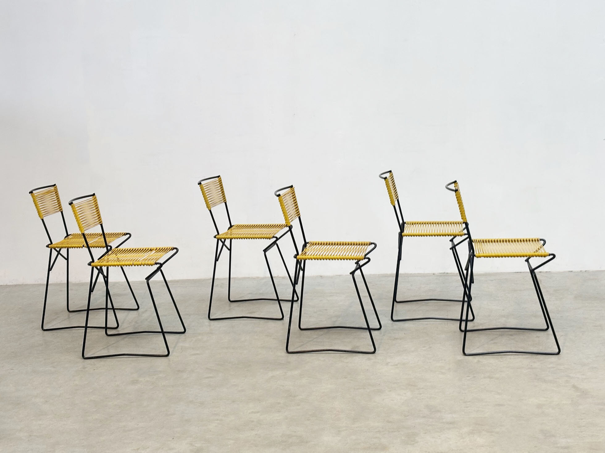 Set of six 'Spaghetti' dining chairs