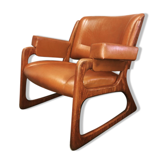 Armchair called "sled" Publisher Baumann and Ottoman