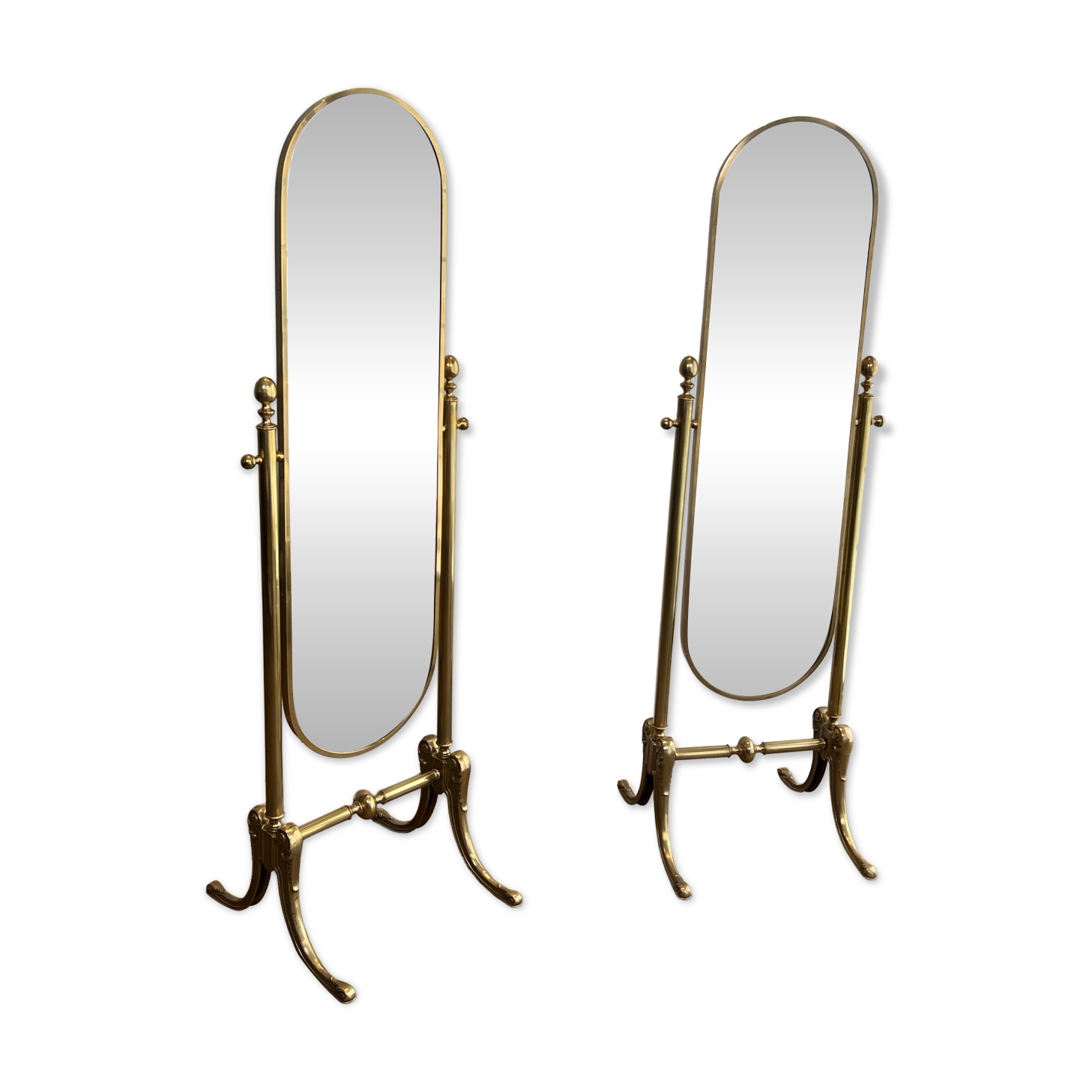 Pair of brass cheval mirrors in neoclassical style