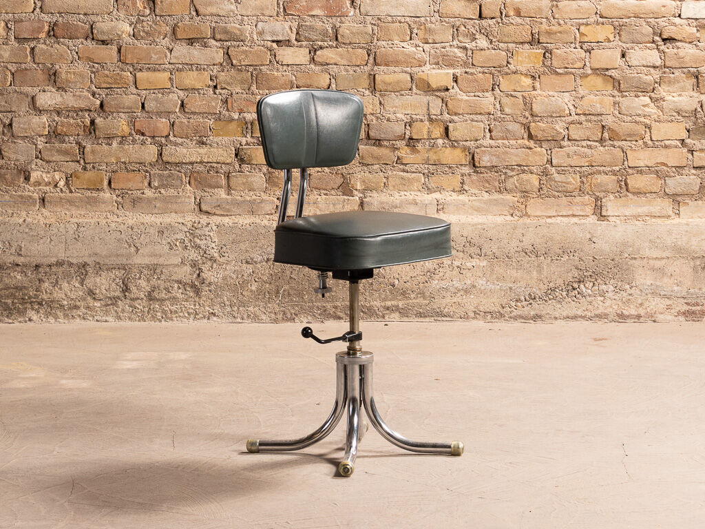 Industrial craft chair made of metal and imitation leather