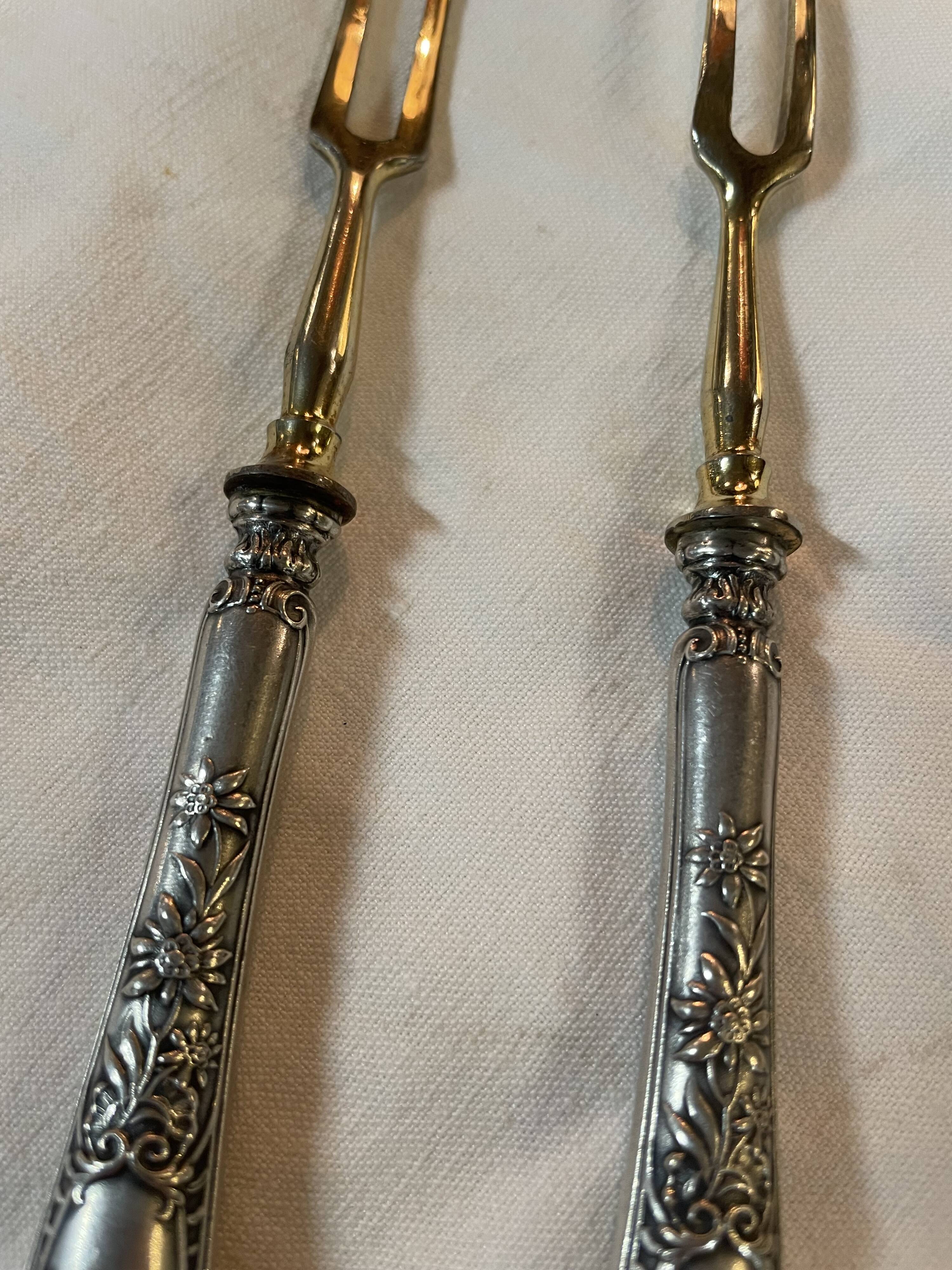 Paire de fourchettes à charcuterie en argent