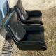 2 vintage faux leather armchairs