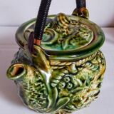 Set of old teapots and honey pot