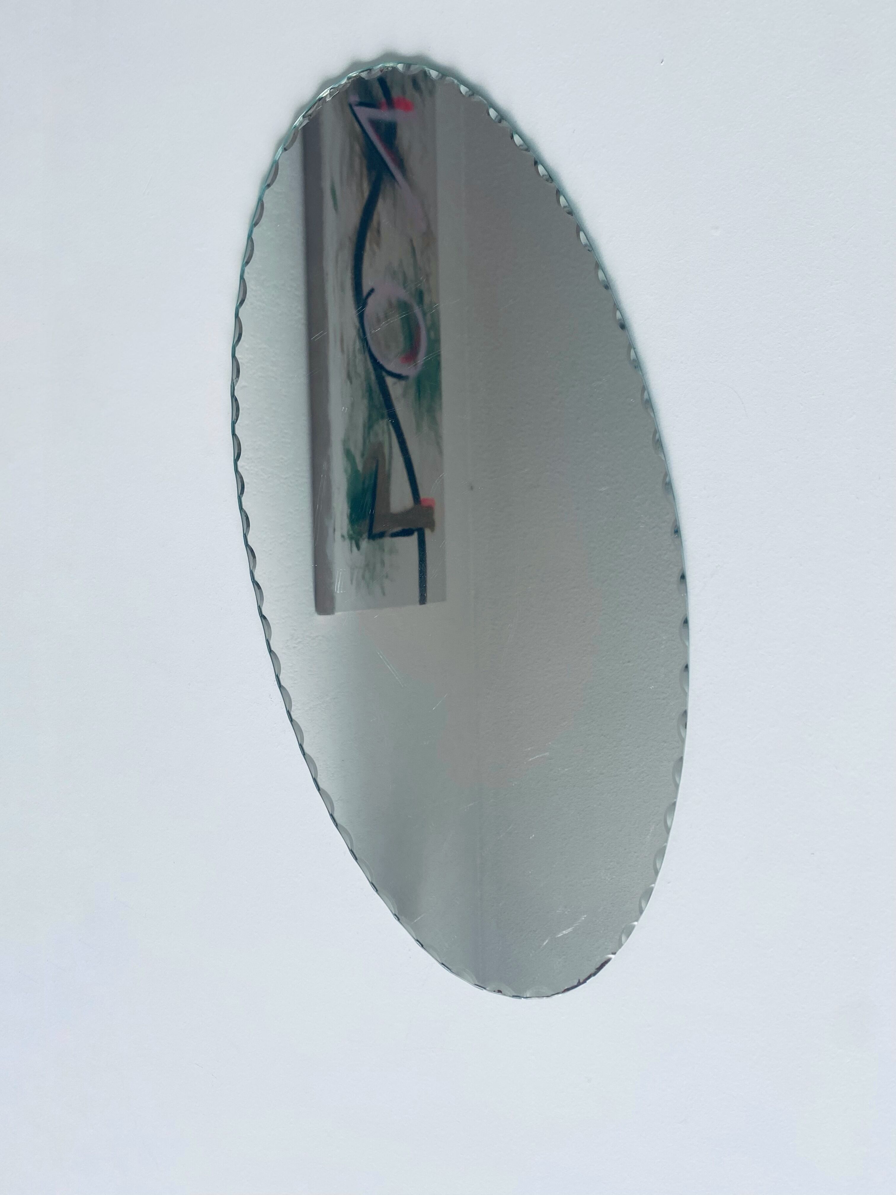 Oval beveled mirror 50x25cm