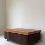 Coffee table with brown corduroy fabric, wooden top and chrome legs
