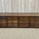 Long low oak countertop with 12 drawers - early XXth