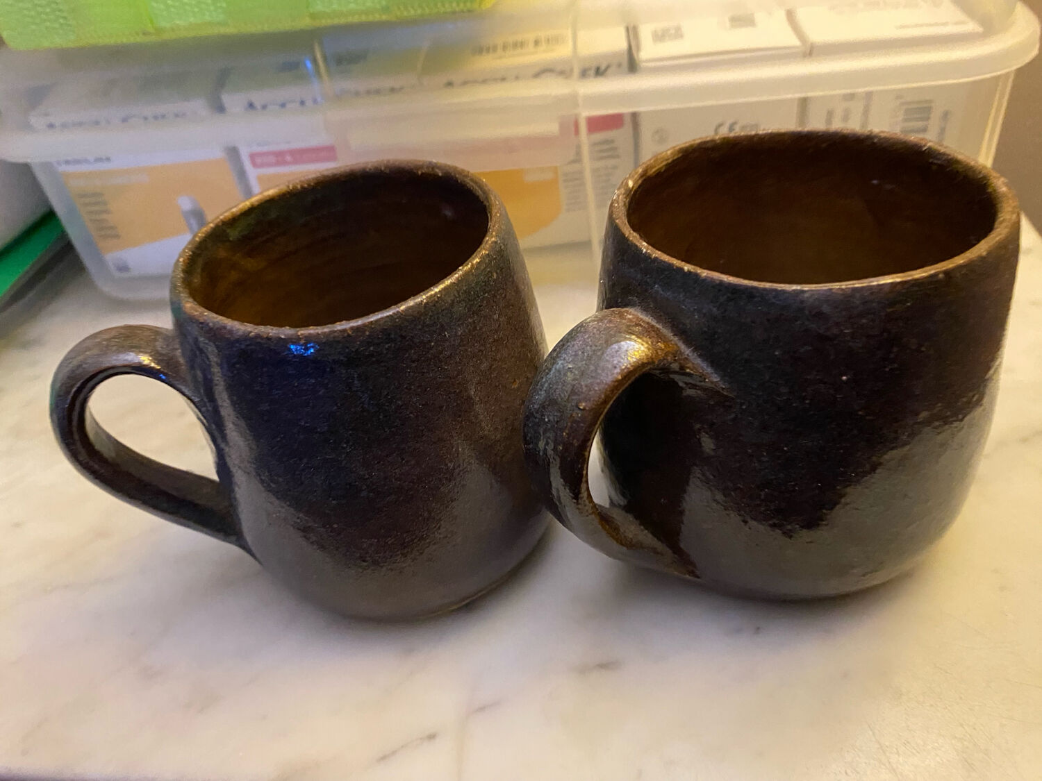 Sets of signed glazed stoneware mugs