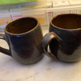 Sets of signed glazed stoneware mugs