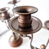 Pair of antique wooden and brass candlesticks